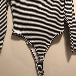 White and black striped long sleeve body suit